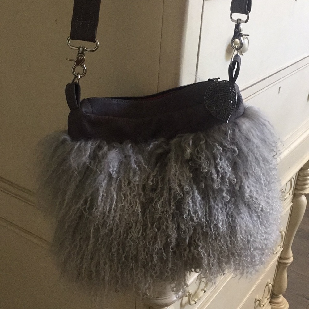 Lady Turco monglian lamb purse.